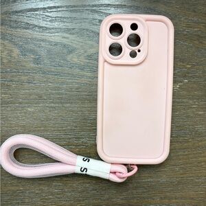 Pink iPhone 15 pro case with wristlet strap